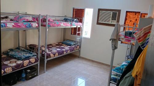 Postel nebo postele na pokoji v ubytování Cozy Vibes Hostel