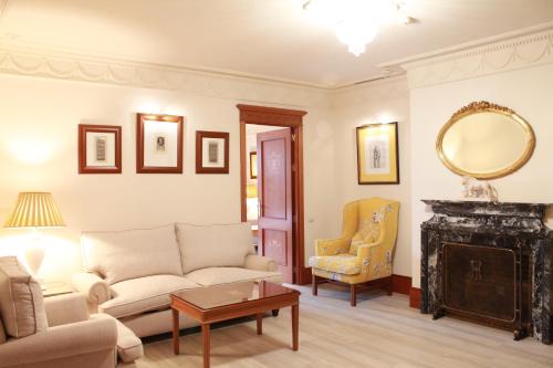 Гостиная зона в Hotel Inglaterra