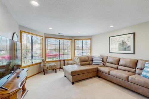 a living room with a couch and a table at Lighthouse Retreat in Arcata