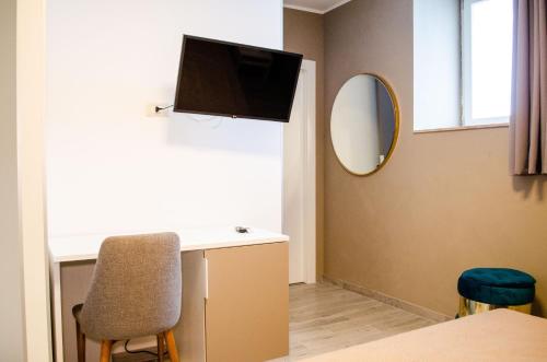 TV a/nebo společenská místnost v ubytování Hotel Montenuovo 44