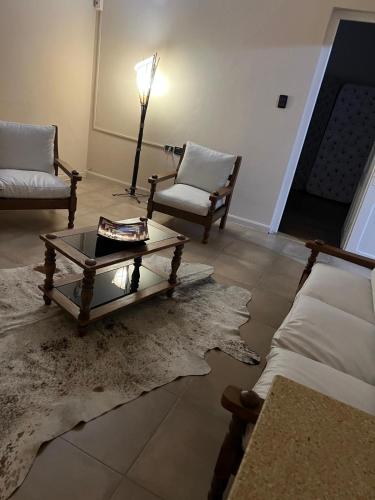 Et opholdsområde på Apartamento céntrico, amplio