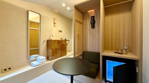 Koupelna v ubytování Cosy Rooms Tapinería