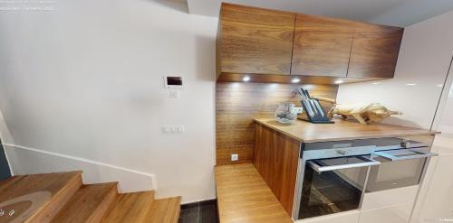 Køkken eller tekøkken på Villa pieds dans l'eau du Lac du Bourget