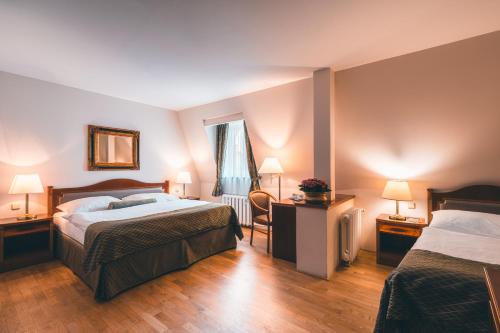 Postel nebo postele na pokoji v ubytování Belvedere