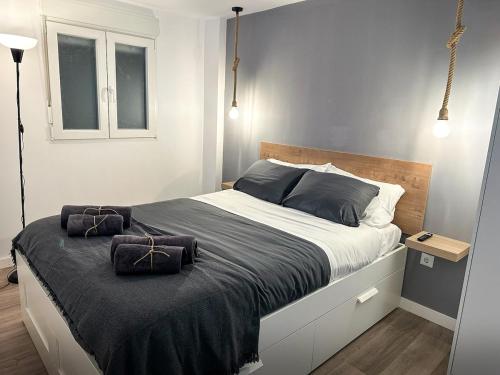 Postel nebo postele na pokoji v ubytování Moderno apartamento reformado con ascensor