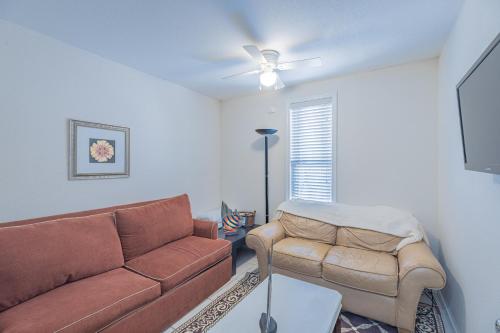 a living room with a couch and a chair at Villa DeLuna in Pensacola Beach