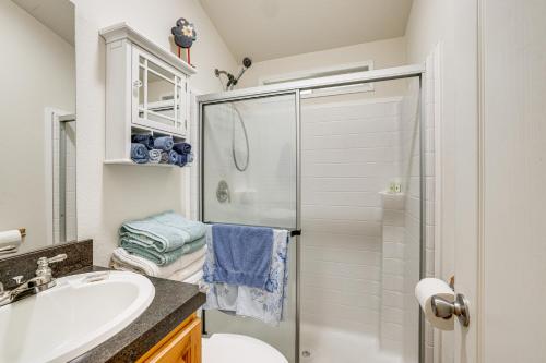 a bathroom with a shower and a sink at Remote Workers Welcome Tiny Home in Port Angeles! in Port Angeles