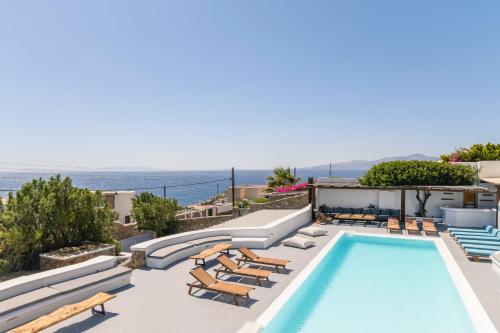 Фотография из галереи Villa Infinium ONE, Sunset views 10' from Mykonos town! в городе Агиос-Стефанос