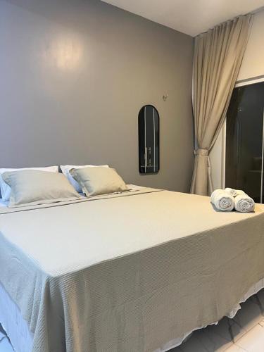 Ένα ή περισσότερα κρεβάτια σε δωμάτιο στο Villa brisa icaraizinho Quarto 6 andar superior