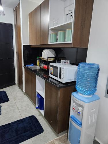 Η κουζίνα ή μικρή κουζίνα στο Comfort Haven Tsavo