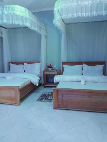 Ένα ή περισσότερα κρεβάτια σε δωμάτιο στο Sweetland view hotel