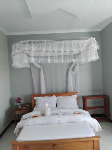 Ένα ή περισσότερα κρεβάτια σε δωμάτιο στο Sweetland view hotel