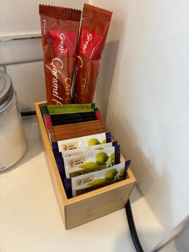 a wooden box filled with food on top of a counter at Weka Retreat in Ashburton