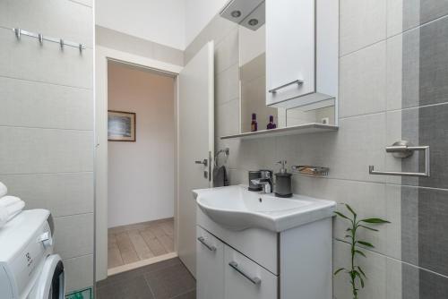 Kúpeľňa v ubytovaní Apartman Špiro