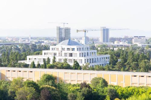 a large white building with a dome on top of it at Green Living with Terrace & Garage by NDP rent in Milan