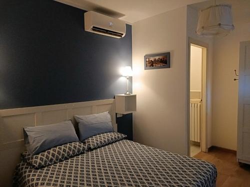 Postel nebo postele na pokoji v ubytování B&B SAN FRANCESCO Pescara Centro