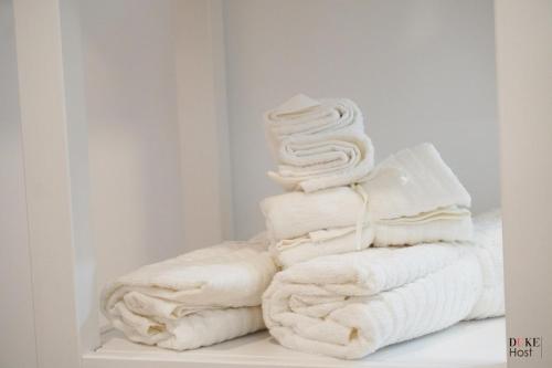 Postel nebo postele na pokoji v ubytování Casa de Huéspedes Gomez Ulla 2