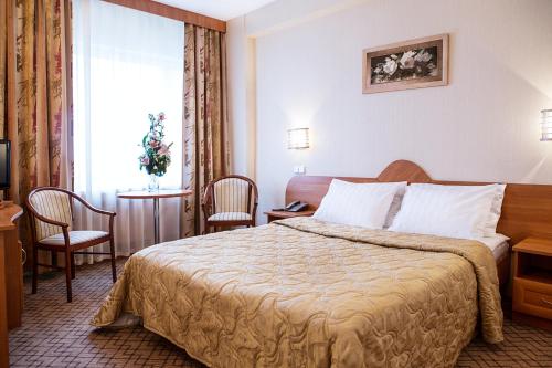 
イズマイロヴォ ベータ ホテルにあるベッド
