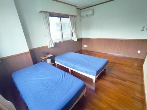 a hospital room with two beds and a window at Kanupata - Vacation STAY 18613 in Ishigaki Island