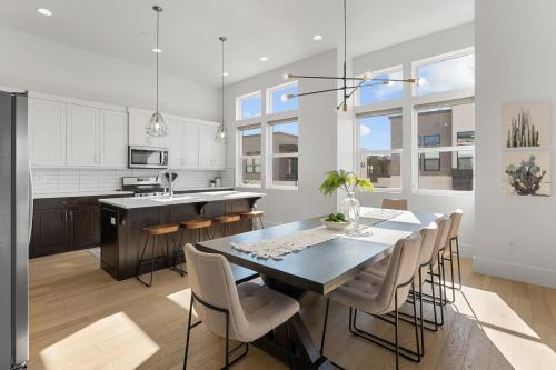 a kitchen and dining room with a table and chairs at Villa #20 at Bloomington Country Club condo in St. George