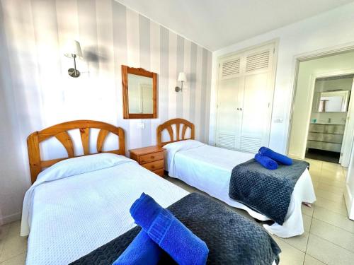 Una cama o camas en una habitación de Casa Sun