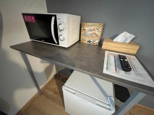 Kuchyň nebo kuchyňský kout v ubytování APARTMENTS TRENČÍN