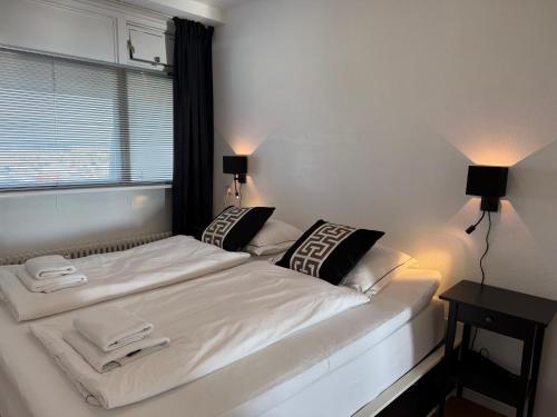 Ένα ή περισσότερα κρεβάτια σε δωμάτιο στο Piano Apartment