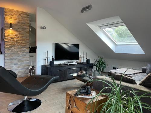 Μια τηλεόραση ή/και κέντρο ψυχαγωγίας στο 5 Sterne Apartment Auszeit