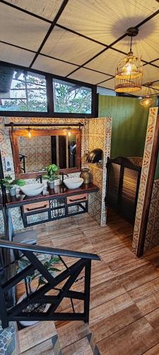 a room with a table and chairs and a dining room at Finca Campestre Villa del Campo in Santa Rosa de Cabal