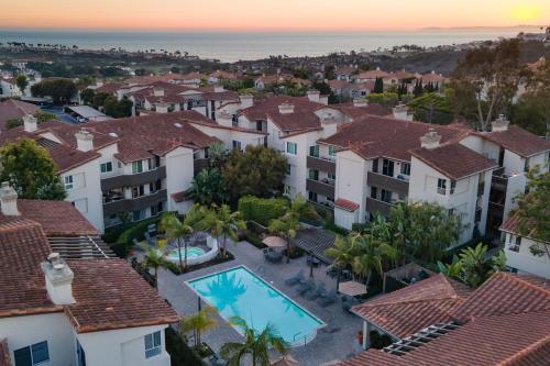 an aerial view of a house with a swimming pool at Walk to Beach Pool Hot Tub Private Patio Parking Seabreeze Retreat in Dana Point