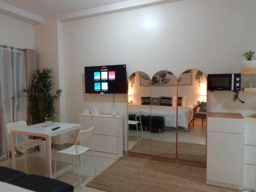 TV a/nebo společenská místnost v ubytování Casa Mila