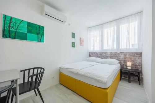 Posteľ alebo postele v izbe v ubytovaní Guest House Arsenal Accommodation