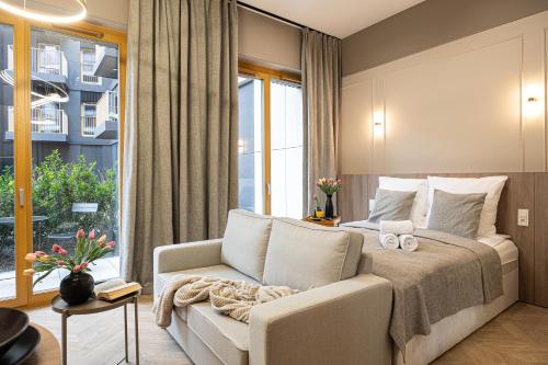 Postel nebo postele na pokoji v ubytování 2HomeRent Apartamenty Nowy Port