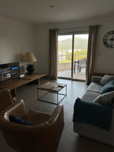 Posezení v ubytování Porto Vecchio Location estivale spacieux appartement 100 m2