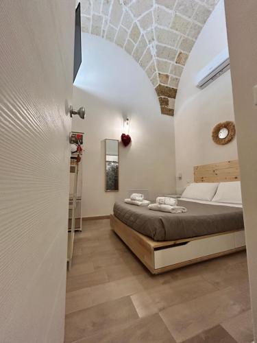 Postel nebo postele na pokoji v ubytování Castrum Rooms