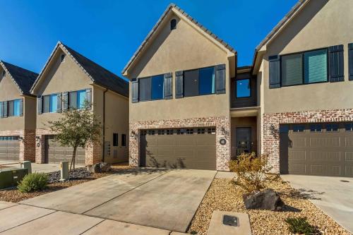 a large apartment building with a garage at Spacious 6-BR Retreat - Heated Pool Sleeps 16 in Santa Clara