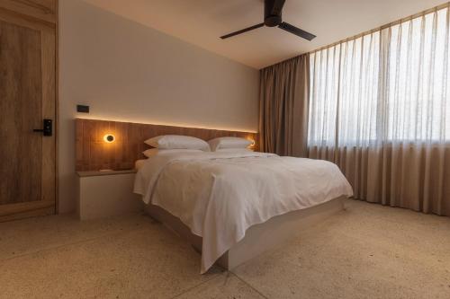 Letto o letti in una camera di Casa Umi Adults only