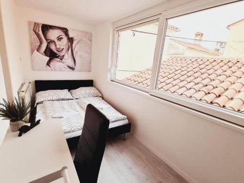 Letto o letti in una camera di HOUSE KOPER Center