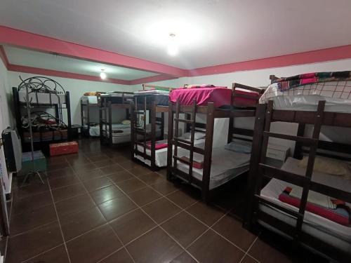 a room with a bunch of bunk beds at Backpackers Oruro B&B in Oruro