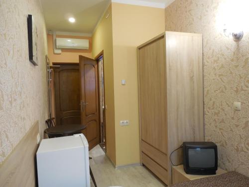 Μια τηλεόραση ή/και κέντρο ψυχαγωγίας στο Gogol Park Rooms