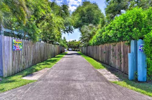 an empty road in front of a fence at Yonegan Maui Getaways - Haiku in Haiku