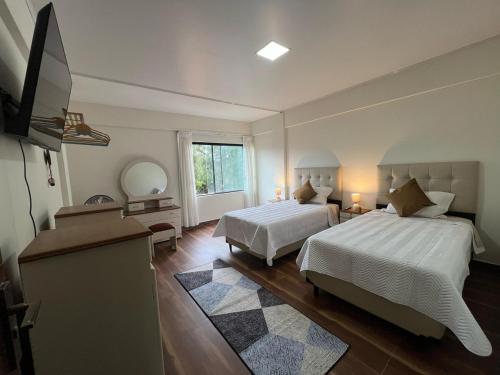 Μια τηλεόραση ή/και κέντρο ψυχαγωγίας στο Casa Jardín Tarija