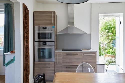 Una cocina o cocineta en Gite de L'Abreuvoir N4 pour 9 personnes