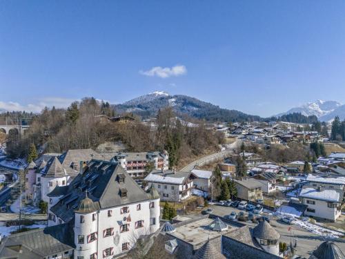 an aerial view of a town with mountains in the background at Bergzeit Fieberbrunn 1 in Hütte