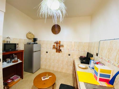 Televisyen dan/atau pusat hiburan di Cozy Moroccan-style apartment