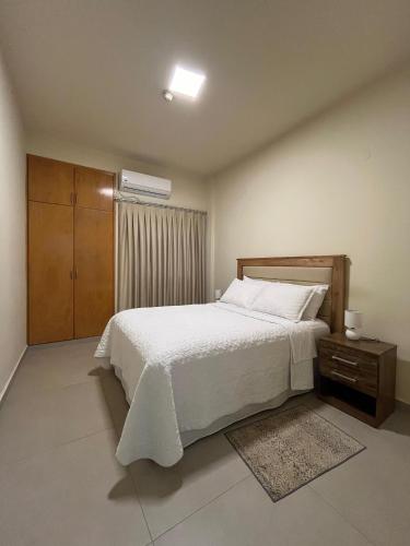 Ένα ή περισσότερα κρεβάτια σε δωμάτιο στο Tu lugar en Ciudad Del Este Dpto 201