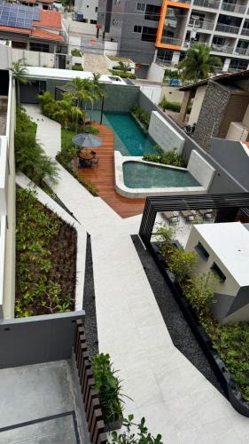 an aerial view of a building with a swimming pool at Vert House in João Pessoa