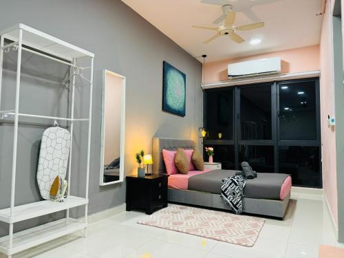 a bedroom with a bed and a window at Core Soho Suites Kota Warisan Sepang KLIA Airport Free Wifi by BKA LEGACY in Sepang