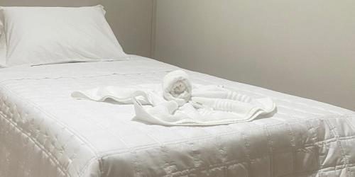 Ένα ή περισσότερα κρεβάτια σε δωμάτιο στο Hotel Marechal Express