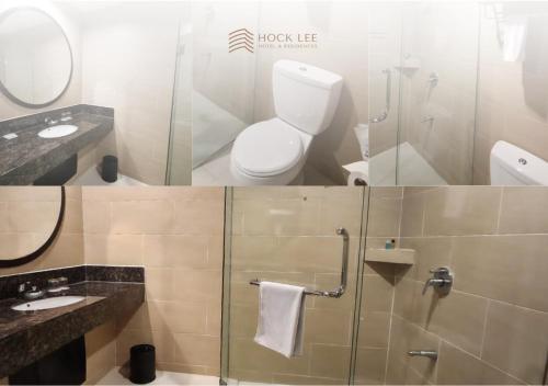 a bathroom with a toilet and a glass shower at Hock Lee Hotel & Residences in Kuching